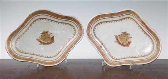 A pair of Chinese export enamelled porcelain lozenge shaped dishes, 19th century, made for the American market, 26.5cm